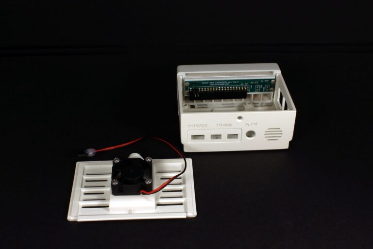 Opened Amiga 3000 Mini case with fan and LED board